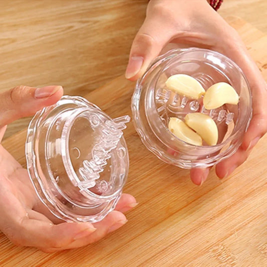 Manual Garlic Twist Crusher & Mincer - Clear Plastic Ginger Grinder - Multi-Functional Kitchen Tool for Effortless Peeling & Mincing.